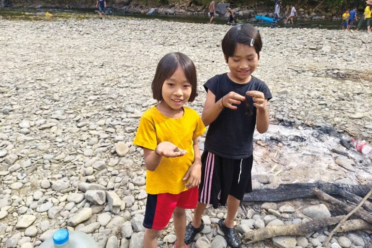 Orphans outing at a river with frogs Myanmar-India