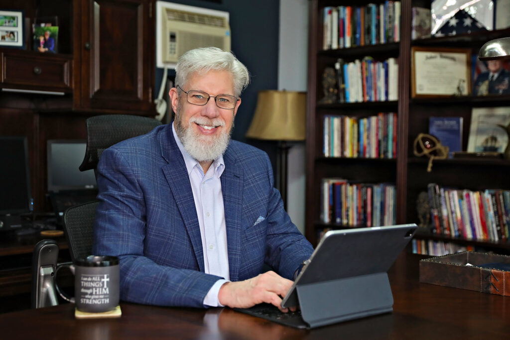 Tim Taylor 2022 in office at Desk